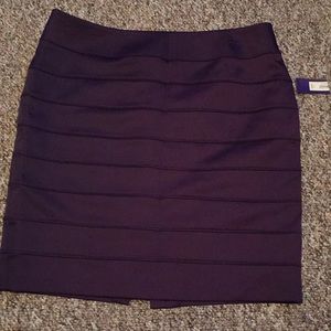 Apt 9, 14 horizontal 2 1/2” pleats, satiny skirt